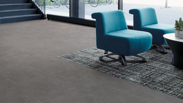 Interface Upload carpet tile and Textured Stones LVT in lobby area with chair